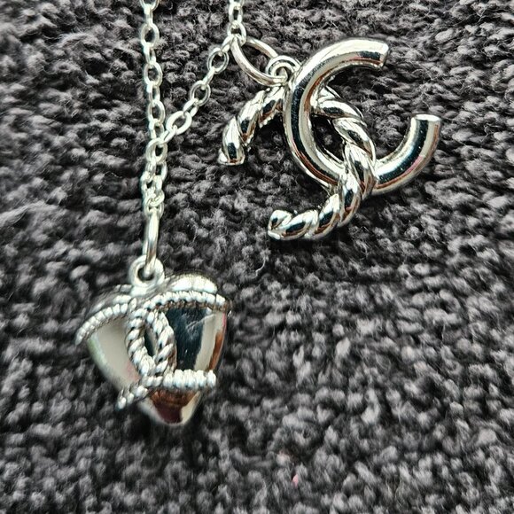 CHANEL Jewelry - Set of 2 Silver Charms